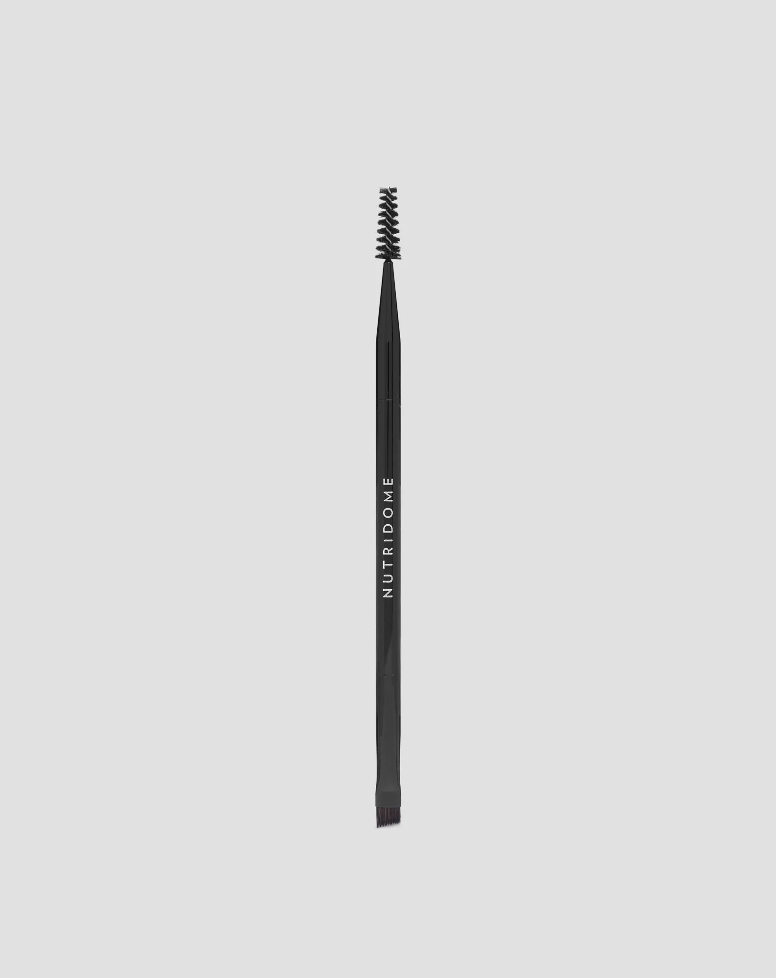 Brosse à sourcils Nutridome avec pinceau pointe inclinée