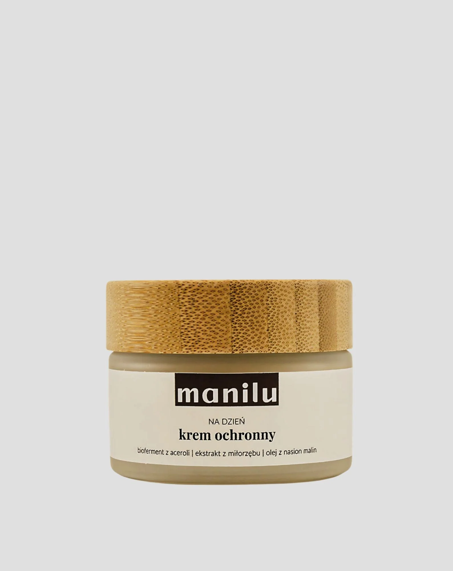 Crème de jour protectrice au beurre de karité, à la vitamine C et à l'huile de pépins de framboise Manilu